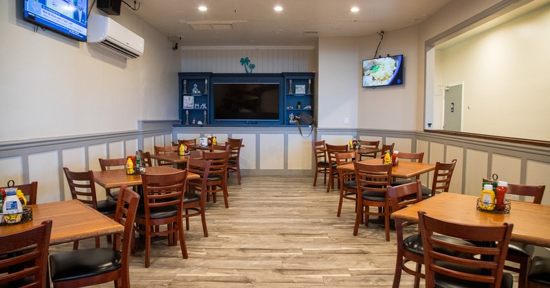 Cozy dining area with dining tables ready for guests