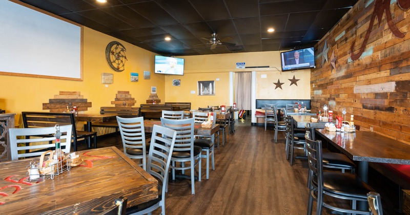Interior, tables and chairs ready for guests