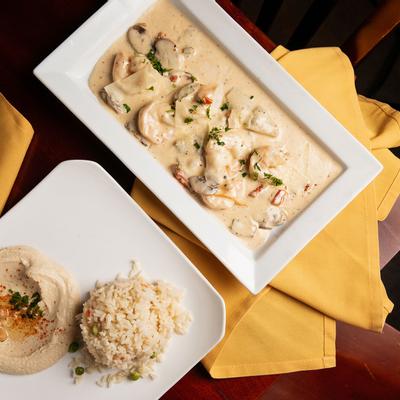 Phoenicia's Shrimp served with hummus and rice pilaf on the side