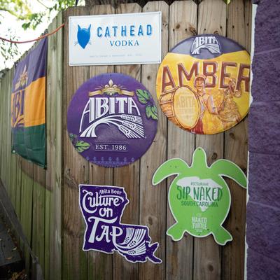 Exterior, signage, decorations on a fence.