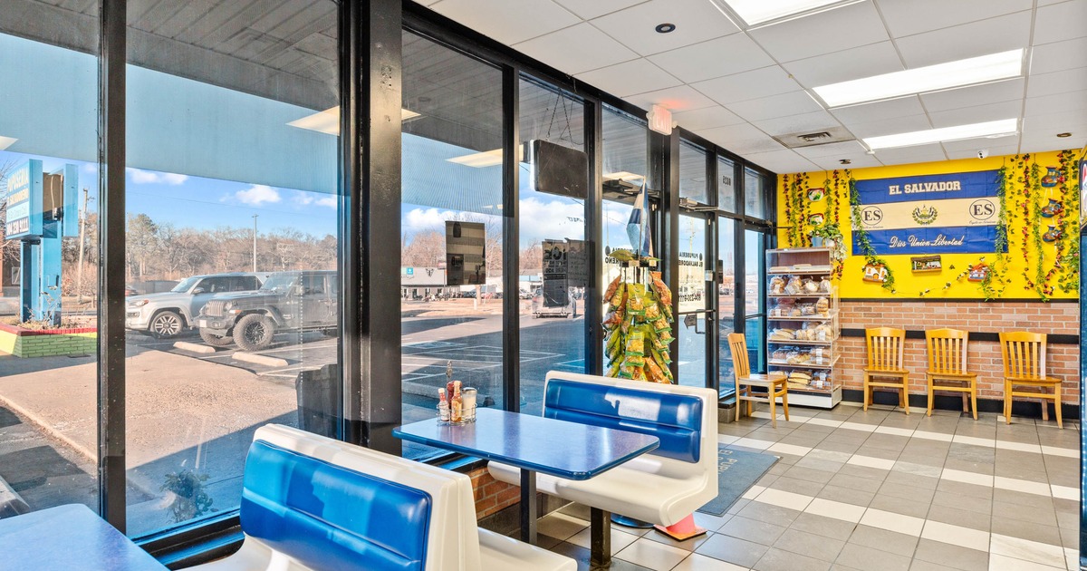 Interior, dining area, seating booths, restaurant entrance, large shop window