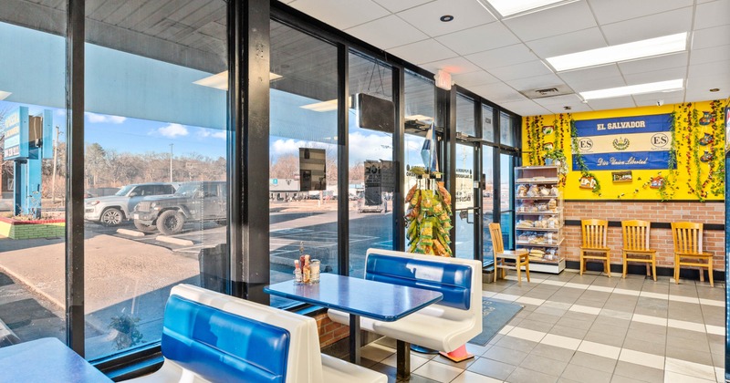 Interior, dining area, seating booths, restaurant entrance, large shop window