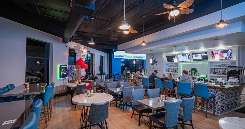 Interior, tables and chairs ready for guests