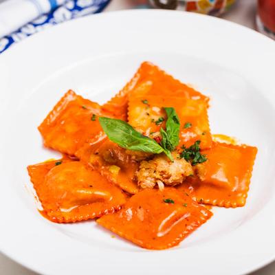 Ravioli in Lobster broth, with cream, extra virgin olive oil, fresh shallots & garlic.