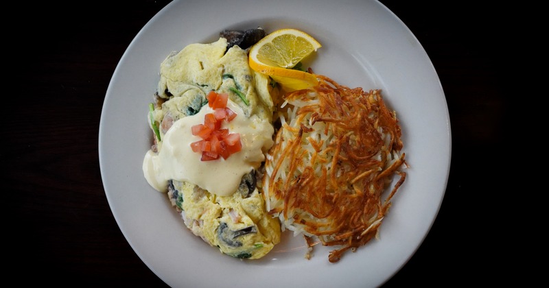 Spinach omelet and hash browns