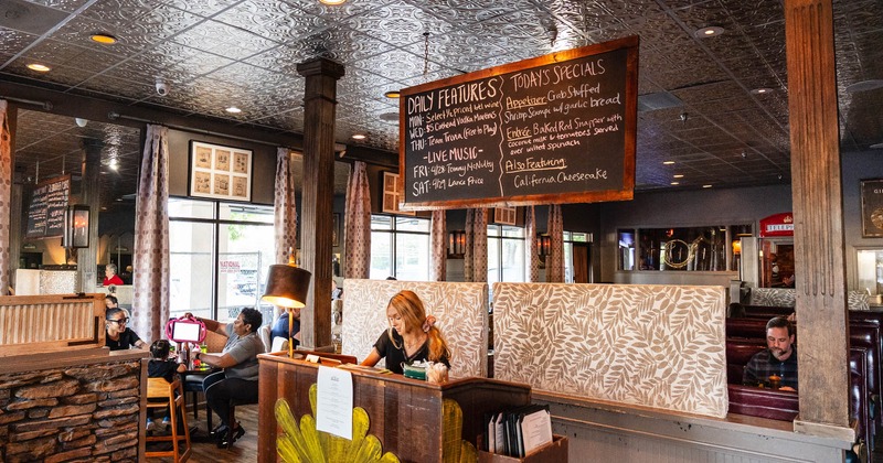 Entrance, restaurant reception, girl staff, info desk