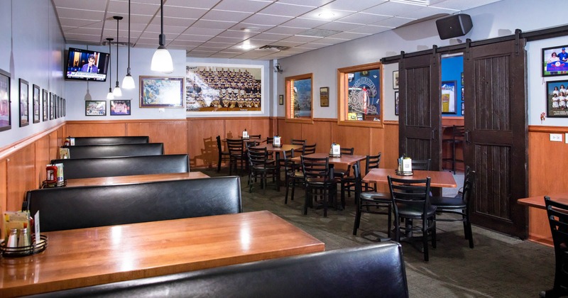Interior of a restaurant with booths and tables