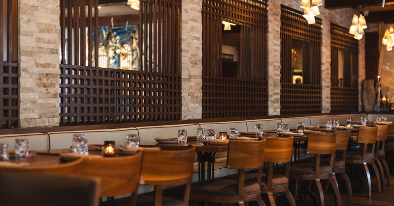 Restaurant interior, lined up dining tables