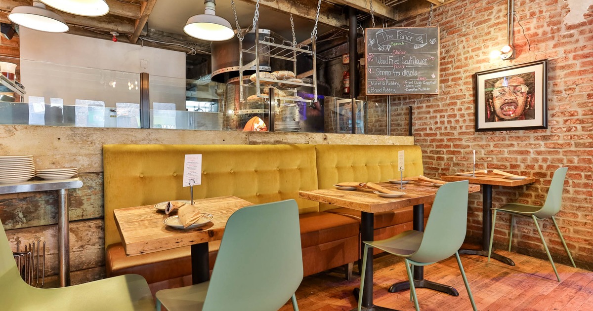 Interior, seating area, tables ready for guests