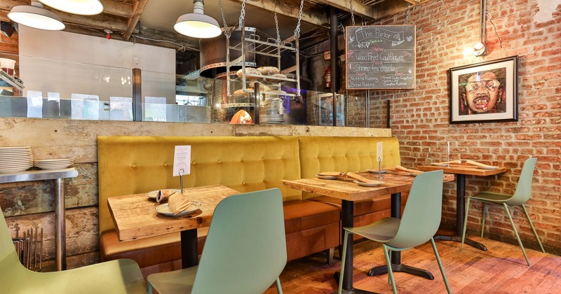 Interior, seating area, tables ready for guests