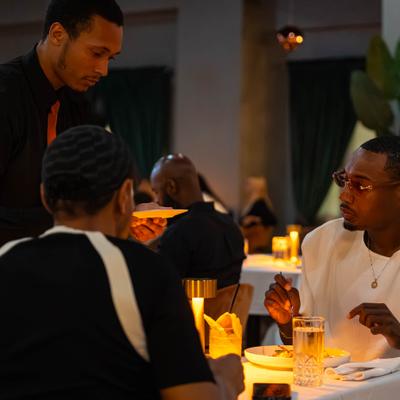 Employee tending to customers.