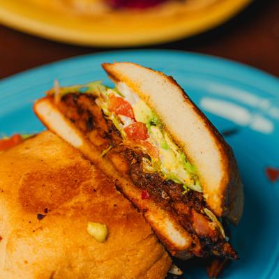 Close-up of a Mexican torta sandwich half.