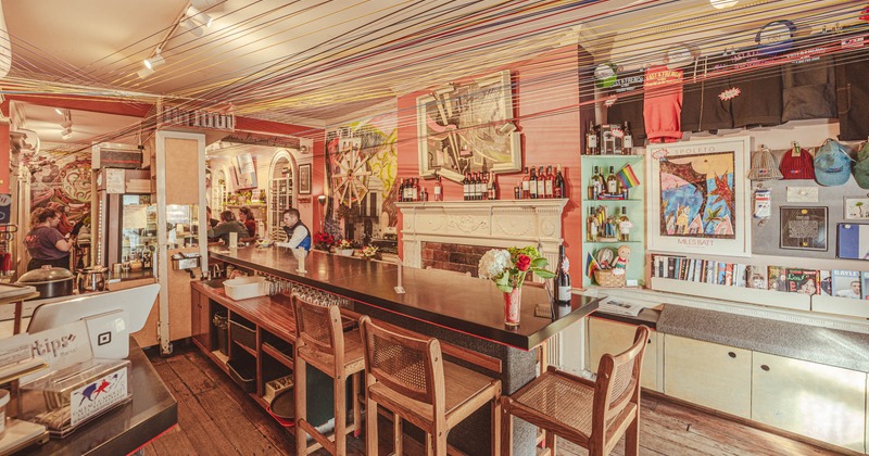 Interior, long table and chairs ready for guests