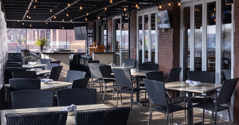 Covered patio with dining tables