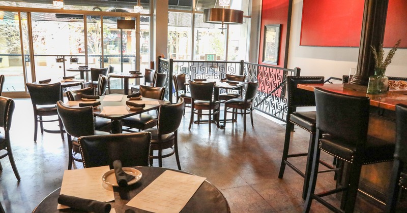 Nicely done interior dining area with set tables ready for guests