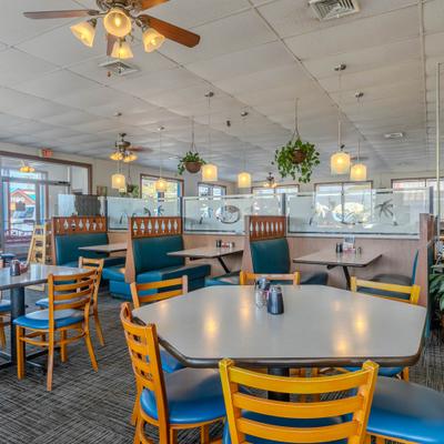 Interior, dining area, tables and chairs.