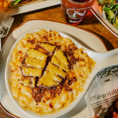 Cheeseburger Mac and Cheese served in a white, handled skillet.