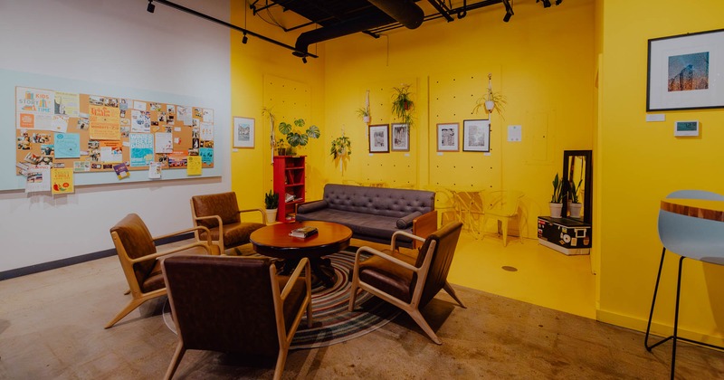 Interior, lounge area, armchairs with wooden coffee table, round rug, sofa