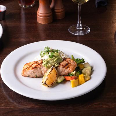 Grilled salmon, with cilantro risotto and veggies.
