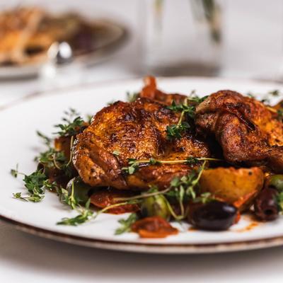 Glazed chicken with arugula salad.