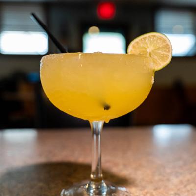 Margarita cocktail with lime garnish.