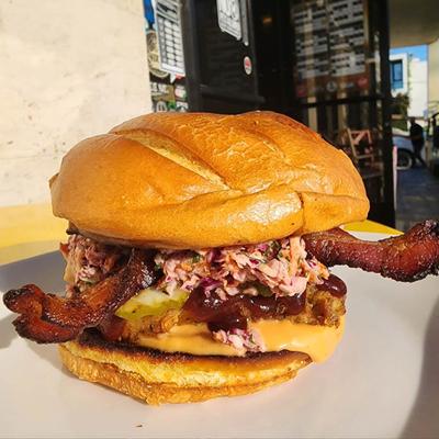 House made coleslaw, BBQ sauce, bacon, pickles and fried chicken.