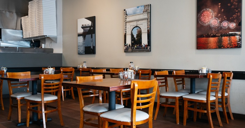 Diner table and chairs,  decorated wall. painting