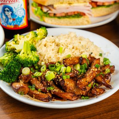 Chicken teriyaki with rice and broccoli.
