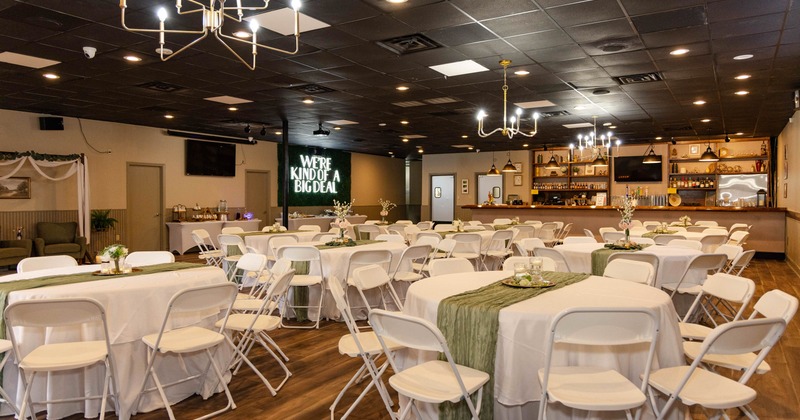 Interior, tables and chairs in event hall