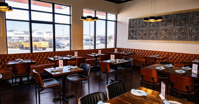 Interior, tables and chairs ready for guests