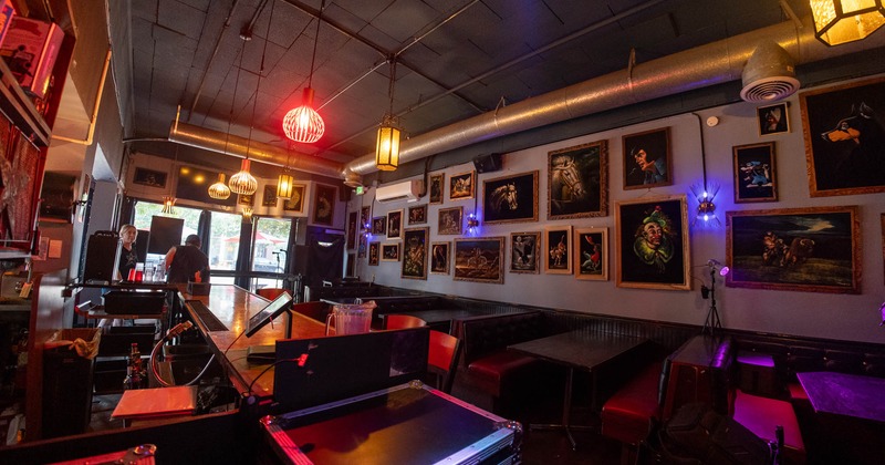 Interior, seating area with a lot pictures on the walls