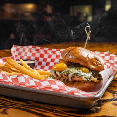 Pesto Chicken Sanwich with fries on the side.