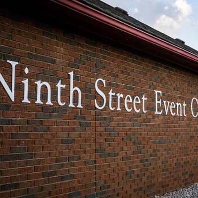 Outside logo for Ninth Street Event Center. White letters,