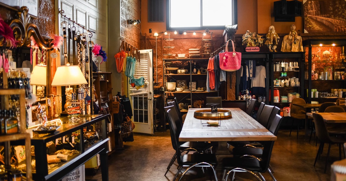 Interior, dining area, highly detailed and decorated walls, merch stand