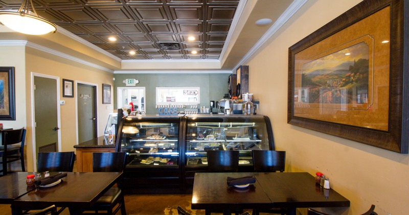 Interior, dining area, display case and coffee bar
