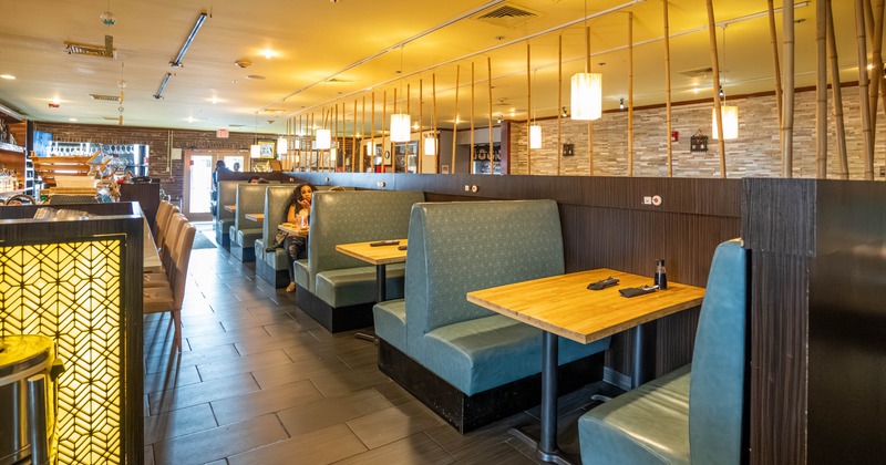 Interior, seating area with booths and tables