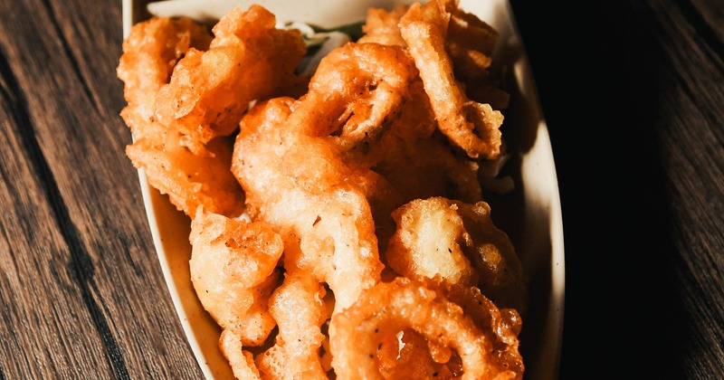 Fried calamari served with a dipping sauce