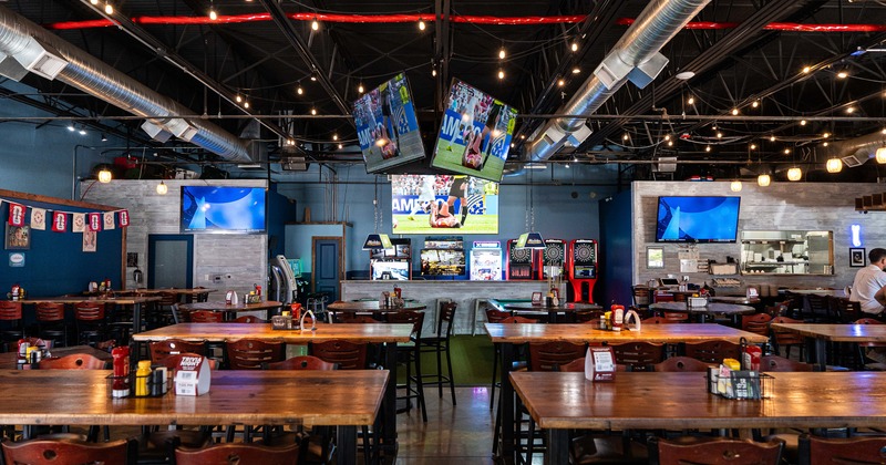 Spacious sports bar interior seating area