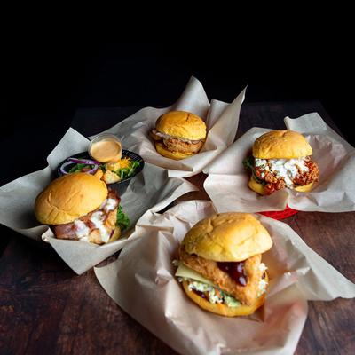 Assorted burgers and sides