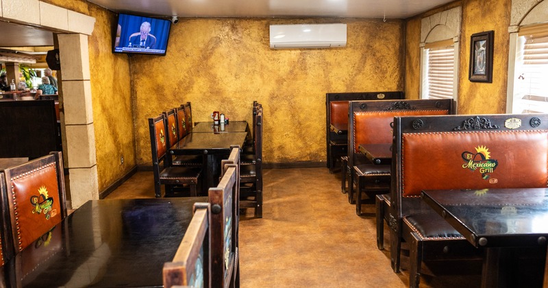 Interior, seating area with boots, tables and chairs