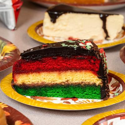 Rainbow cake slice.