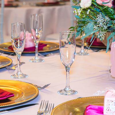 Plates, utensils, napkins, and glasses.