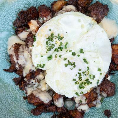 Grilled meat with cheese on top