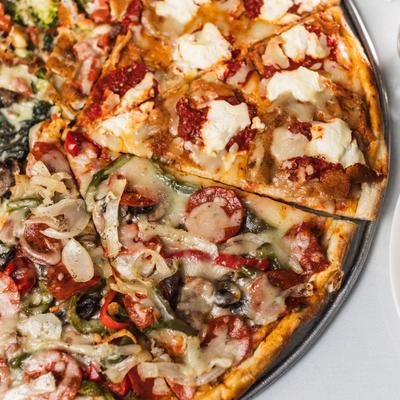 Pizza with various ingredients.