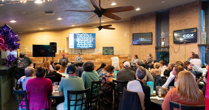 Interior, dining area full of guests enjoying their food