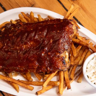BBQ Baby Back Ribs, served with fries, and coleslaw.
