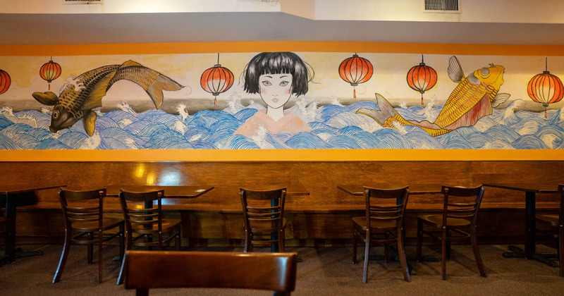 Interior - beautifully decorated wall, wooden tables and chairs