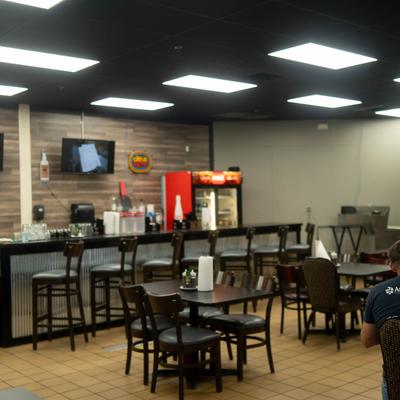 Interior, seating area and a bar.