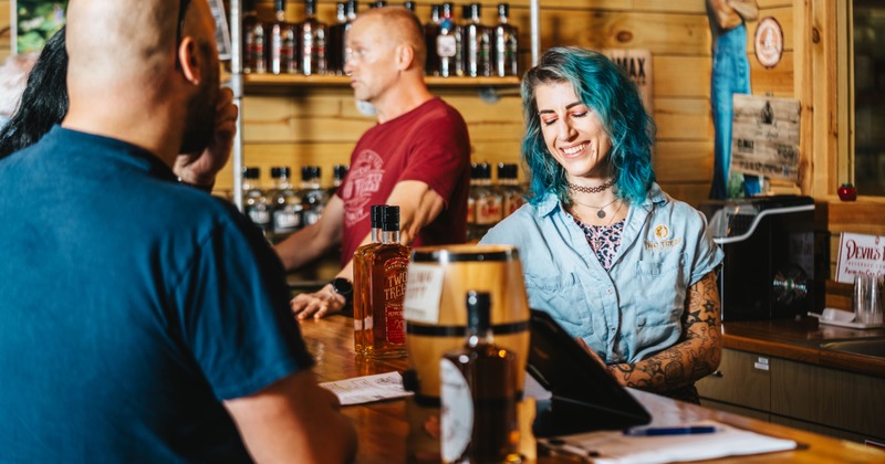 People smiling at the bar