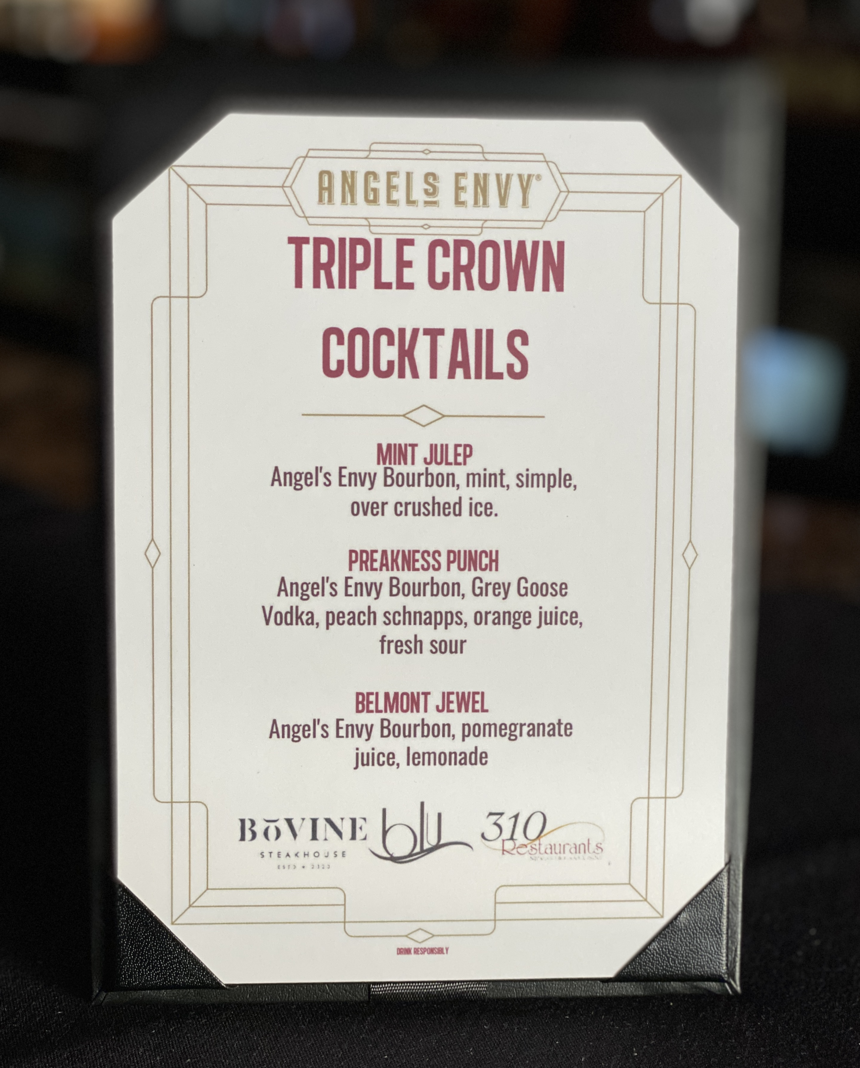 A cocktail featured drink flyer promoting Angels Envy bourbon and a few specialty drinks.